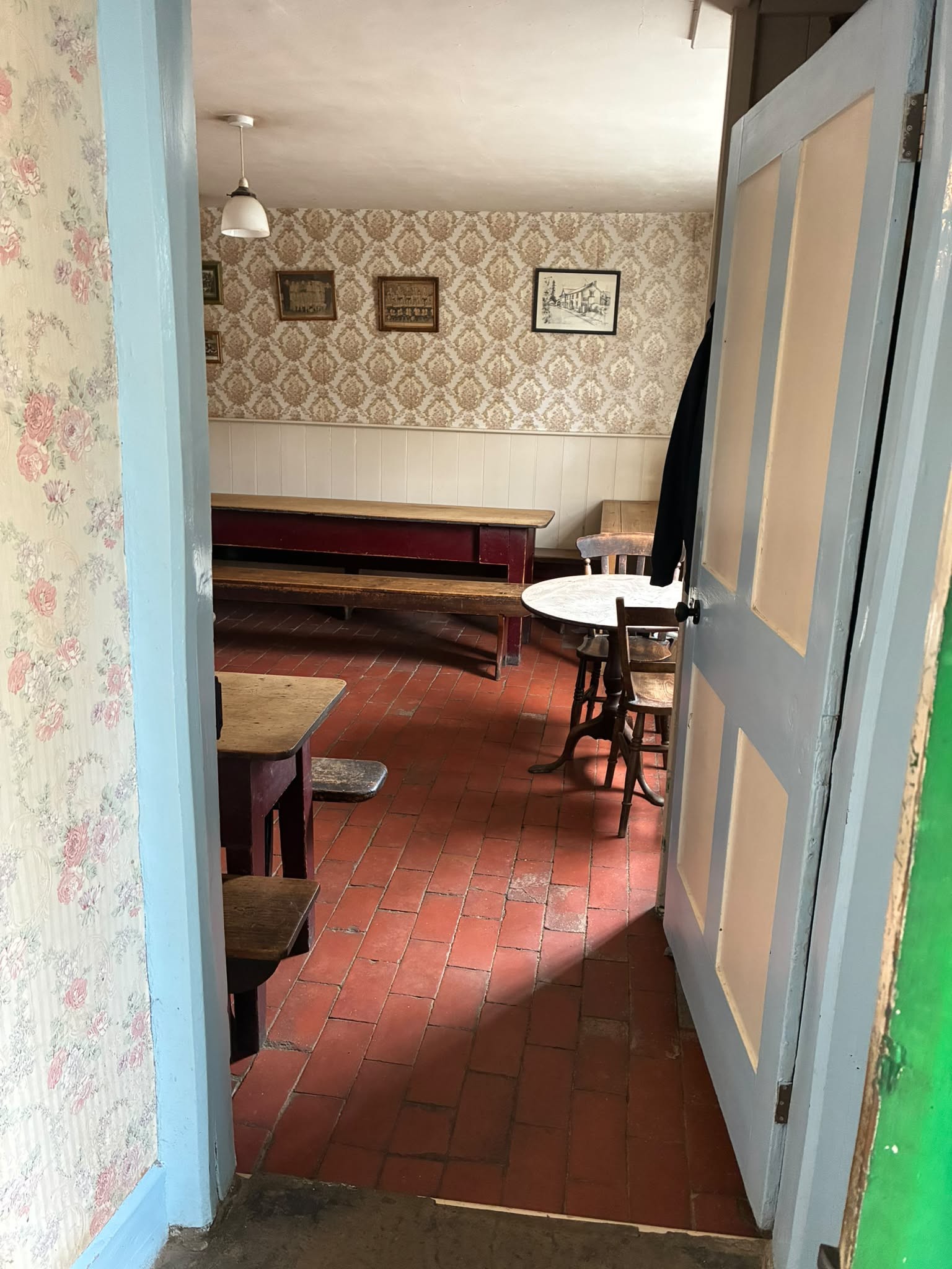 Doorway into Red Brick Bar.  by Ellie Hudspith